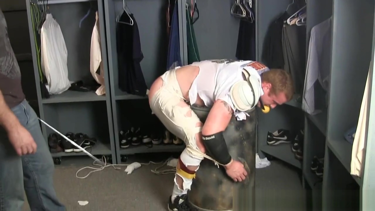 Tall redheaded football player bound gagged stripped and spanked.