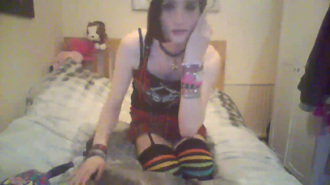 Furry Emo Femboi playing with her toys