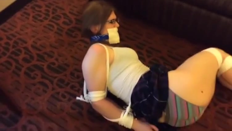 Bondage Girl Struggles From Couch To Floor