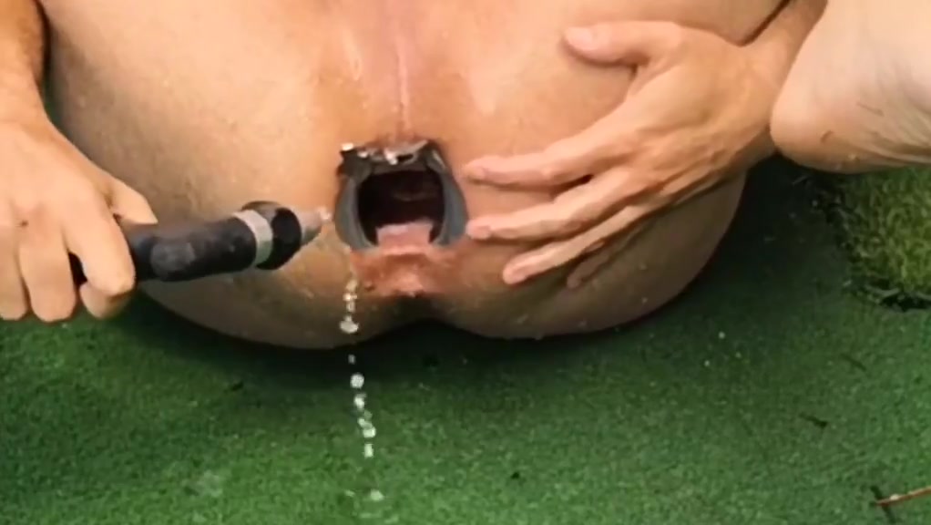 Anal speculum and toys outdoor in garden